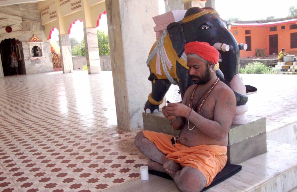 A SADHU IN BHARTHARI CAVE